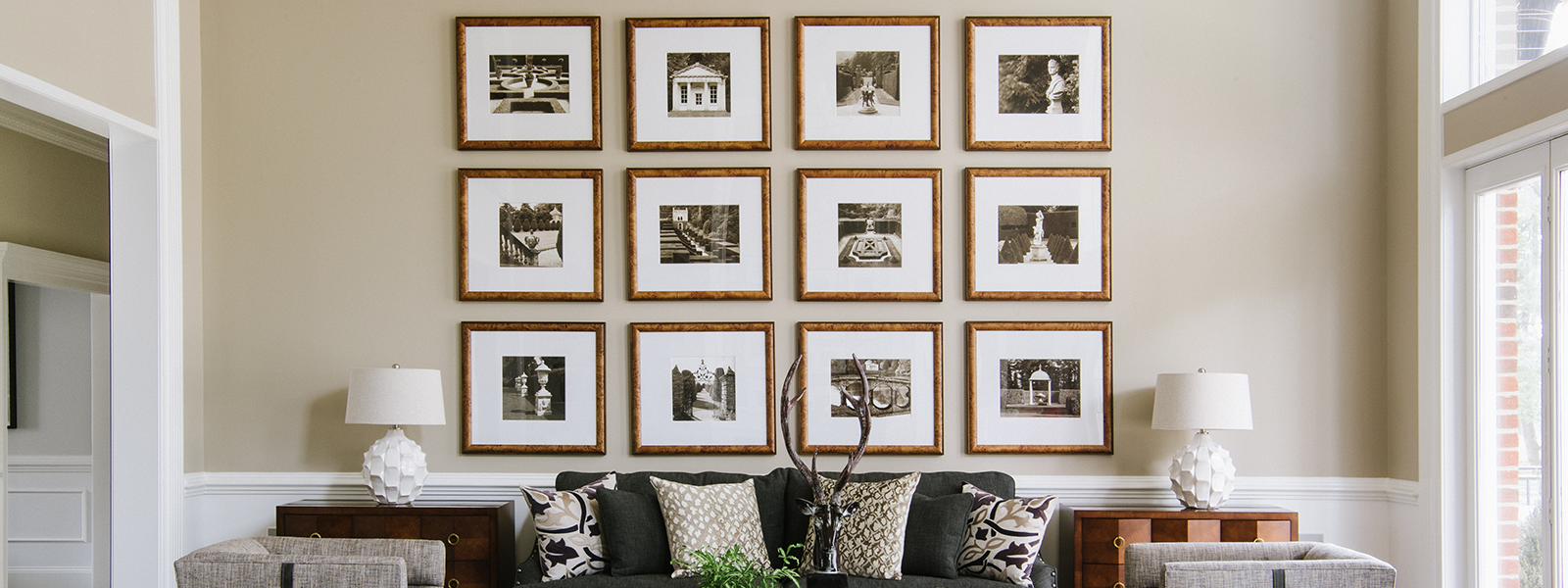 Gallery wall of black & white photos from Bountiful custom framing in Easton, Maryland